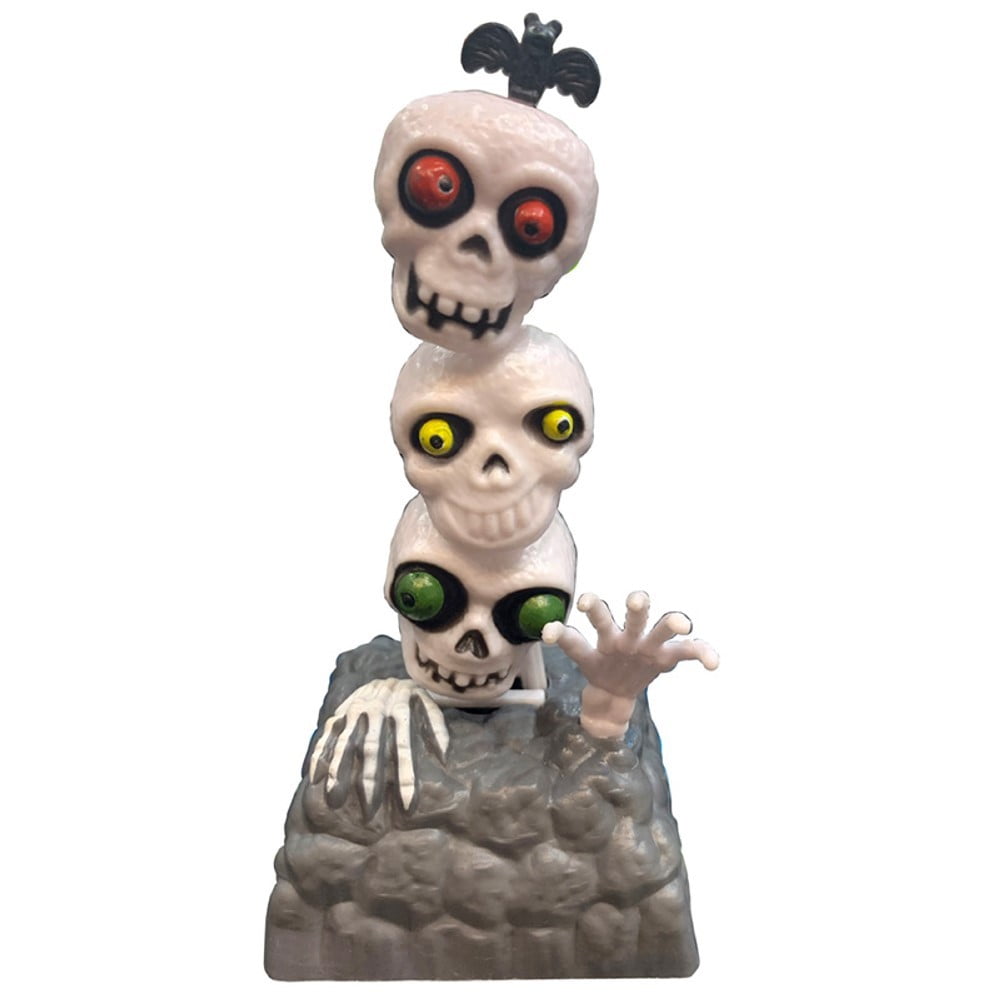Figurine solaire 3 crânes